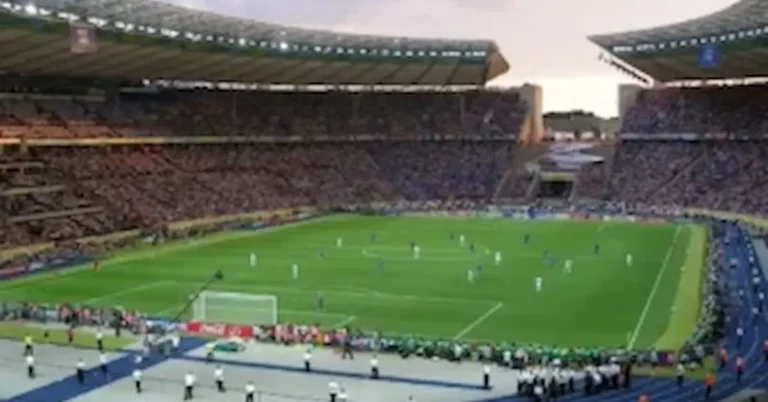 A crowded football stadium background for users looking to enjoy World Cup 2026 live matches.