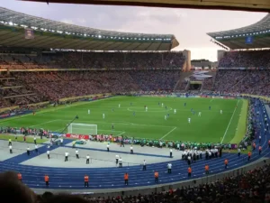 A crowded football stadium background for users looking to enjoy World Cup 2026 live matches.