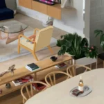 A conceptual visualization of Adaptive Flexibility and Quality of Life, showing a compact living space that transforms to meet human desires and functional needs.