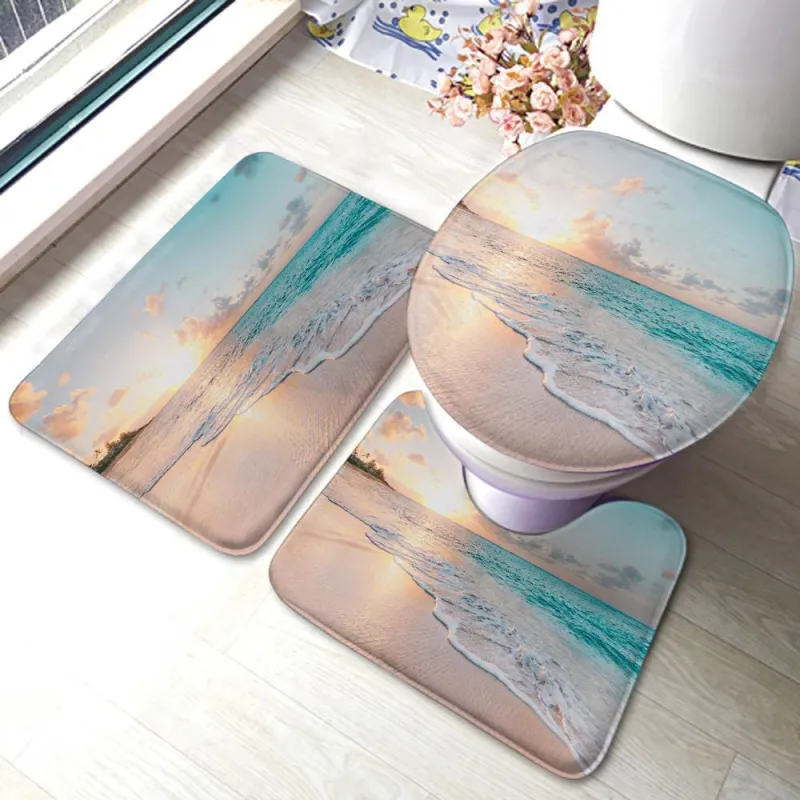 Beach-themed 3-piece bathroom rug set with anti-slip mats, toilet lid cover, and U-shaped toilet rug for small bathrooms.