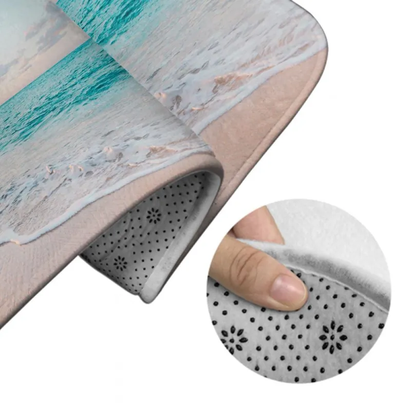 Close-up of a non-slip bathroom rug set showing the soft surface, anti-skid backing, and beach-themed design for enhanced bathroom safety.