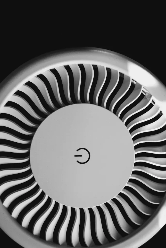 A compact smart air purifier and ventilation unit showing top features to prioritize for the best smart ventilation for small spaces in winter